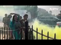 Parliament Security Breach | 2 Carrying Cans That Emitted Yellow Smoke Detained Outside Parliament  - 01:02 min - News - Video
