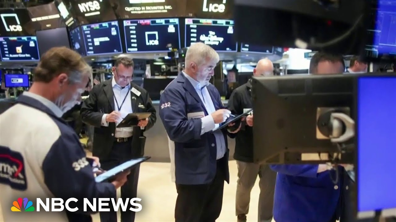 Dow closes above 40,000 for first time ever