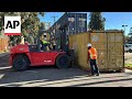 UC Berkeley clears Peoples Park, builds wall of shipping containers