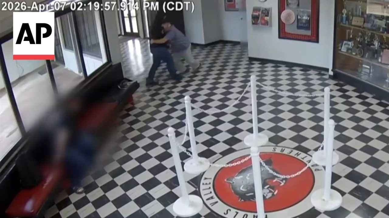 Video shows Oklahoma high school principal tackling a man with a gun