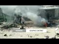 WARNING: GRAPHIC CONTENT - Blasts kill 26 on eve of Pakistan election | REUTERS  - 00:43 min - News - Video