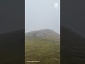 Man struggles to stay upright as powerful winds hit France