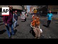 Effigies of political leaders set on fire as part of Judas burning tradition in Venezuela