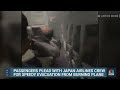 Video shows passengers stuck on burning plane in Japan  - 01:00 min - News - Video