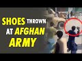Viral Video: Afghan citizens express displeasure with Afghanistan Army by throwing stones and shoes