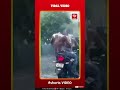 Viral video shows men taking bath on bike amidst rain
