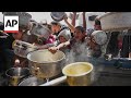 Desperate families scramble for food in Gaza