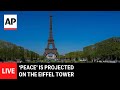 LIVE: ‘Peace’ is projected on the Eiffel Tower in Paris, France