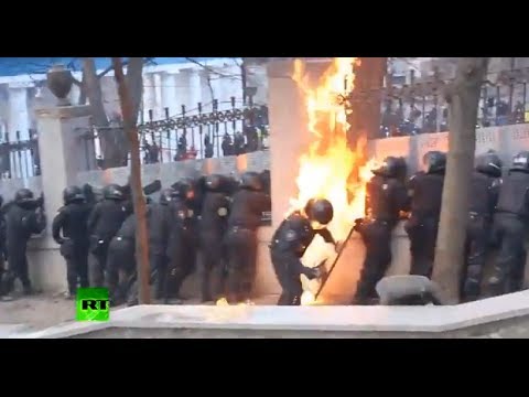 Cops on fire as Molotov cocktails flare, flash and bang over Kiev