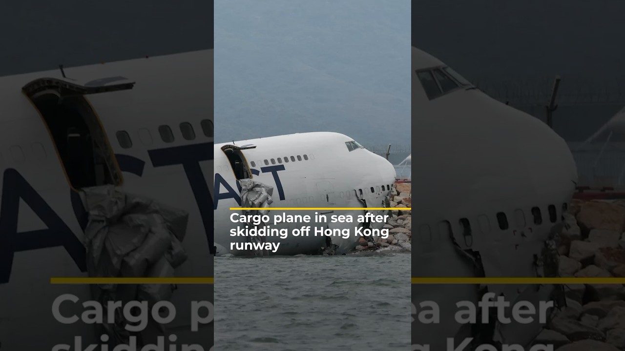 Cargo plane skids off Hong Kong runway into sea | AJshorts