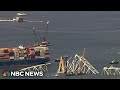 Massive Baltimore bridge cleanup continues