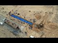 Drone Footage Shows Over 100 Dead Gazans Buried In Mass Grave | Israel-Gaza War  - 03:16 min - News - Video