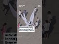 Activists unroll a giant banner protesting Jeff Bezos wedding in Venice  - 00:15 min - News - Video