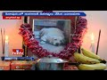 Pet dog's obsequies observed by owner, at Pitapuram