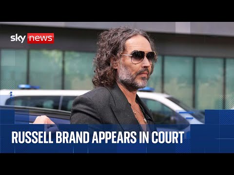 Russell Brand arrives at court for plea hearing