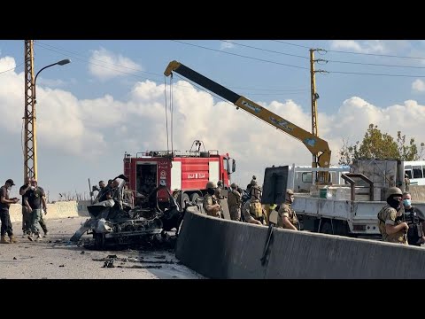 Aftermath following Israeli strike on car near Beirut | AFP