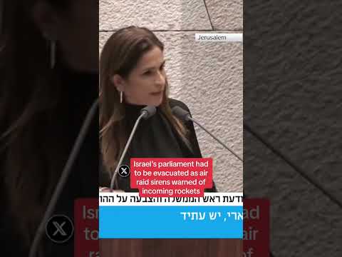 Moment Israeli minister evacuated from parliament