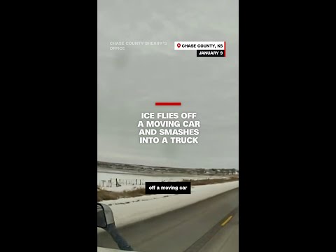 Ice flies off a moving car and smashes into a passing truck’s windshield
