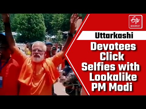 Devotees click selfies with Prime Minister Narendra Modi's lookalike at Uttarkashi