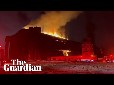 Giant fire engulfs historic hangar in California