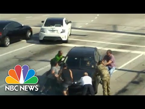Woman falls unconscious while driving car, good samaritans save her