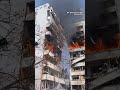 Video shows Russian missile strike on apartment building