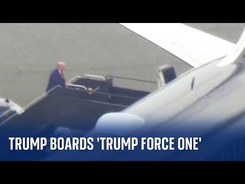Former President Donald Trump boards flight to face charges