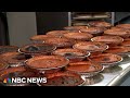 Migrant families in New York bake pies for those in need