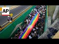Rainbow flags fly as LGBTQ+ community of Ecuador marches for equal rights
