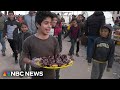 WATCH: Kids sell food and drink on the streets of Rafah to help support families