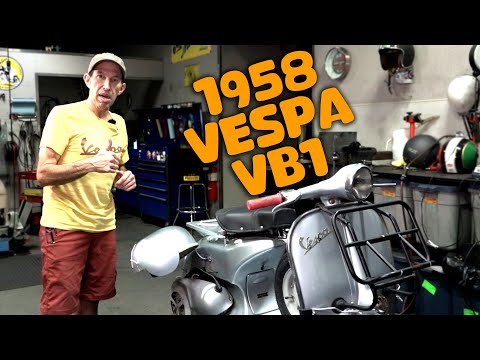 Robot Checks Out a Customer's 1958 Vespa VB1 Scooter