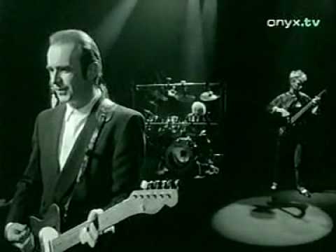 status quo "in the army now"  (video clip)