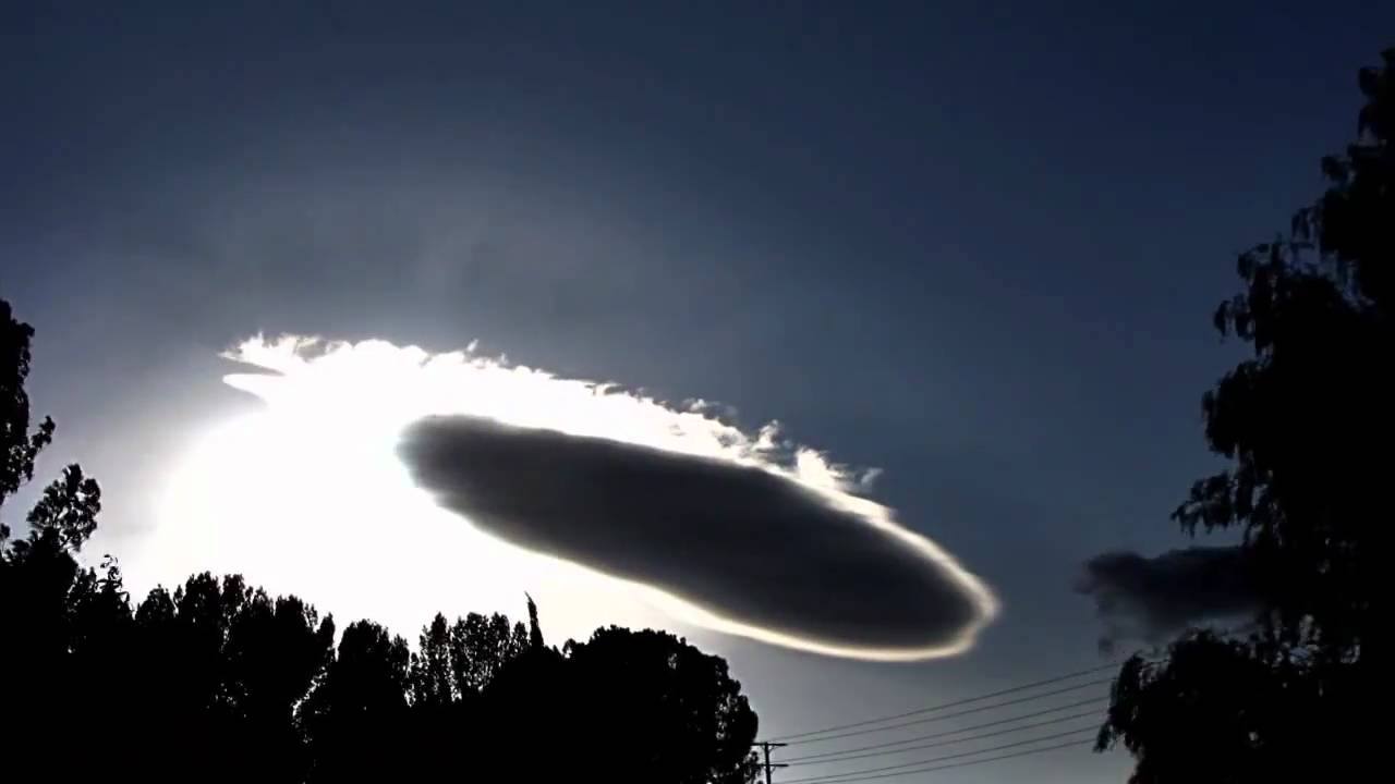 Cloaked UFO in the clouds - timelapse - YouTube