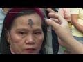 Catholics in the Philippines mark Ash Wednesday with cross of ashes on foreheads  - 00:39 min - News - Video