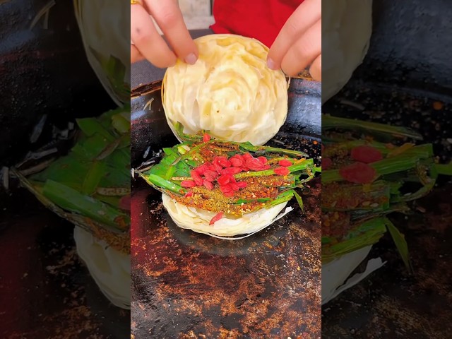 Chinese burger Grilled leeks on stone
