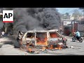 Gunfire erupts in Haiti as thousands protest a surge of gang violence