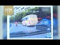 Girl falls out of bus window -Caught On Camera