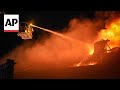 Firefighters tackle blazes after Russian ballistic missile strike on Odesa, Ukraine