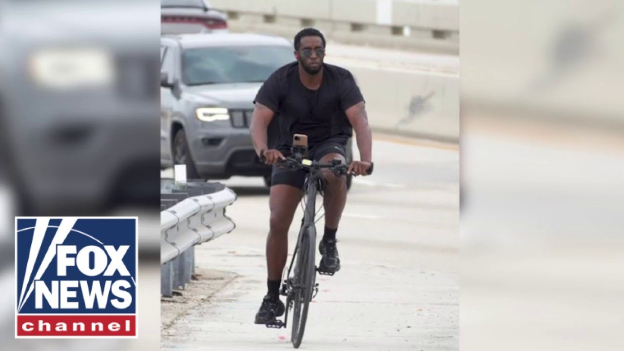 Photos show Sean 'Diddy' Combs riding his bike in Miami days after raid
