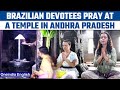 Brazilian devotees pray and consume Prasad at Sri Kalahasteeswara temple in AP