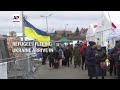 Refugees fleeing Ukraine arrive in Poland