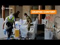 WARNING: GRAPHIC CONTENT: Blood removed from Israeli village destroyed by Hamas