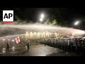 Georgian police use water cannons to try to disperse Tbilisi protesters