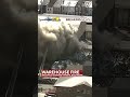 Smoke billows from warehouse fire #shorts  - 00:59 min - News - Video