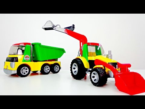 A Bruder tractor, a toy truck & PAW Patrol toys.