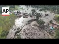 Flash floods and cold lava flow hit Indonesia’s Sumatra island, causing numerous deaths