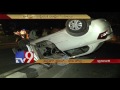 Car overturns after hitting divider at Panjagutta, drunk driver escapes from scene