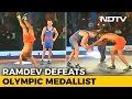 Baba Ramdev Defeats Olympic Medalist Stadnik in Wrestling Match
